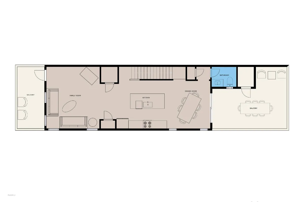 An open-plan interior showing a modern kitchen, family room, dining area, and a balcony with ocean views. The kitchen is equipped for cooking and entertaining, while the adjacent spaces invite relaxation and togetherness. Large windows and a balcony reinforce the connection to the outdoor scenery.